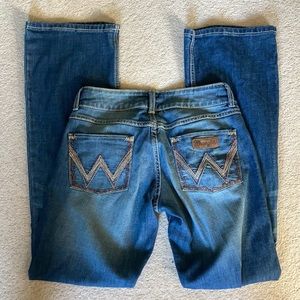 Wrangler light wash boot cut jeans size 5